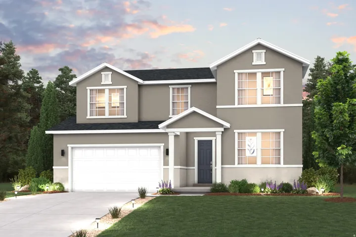 Two-story residence featuring a two-car garage, manicured lawn, and mature trees