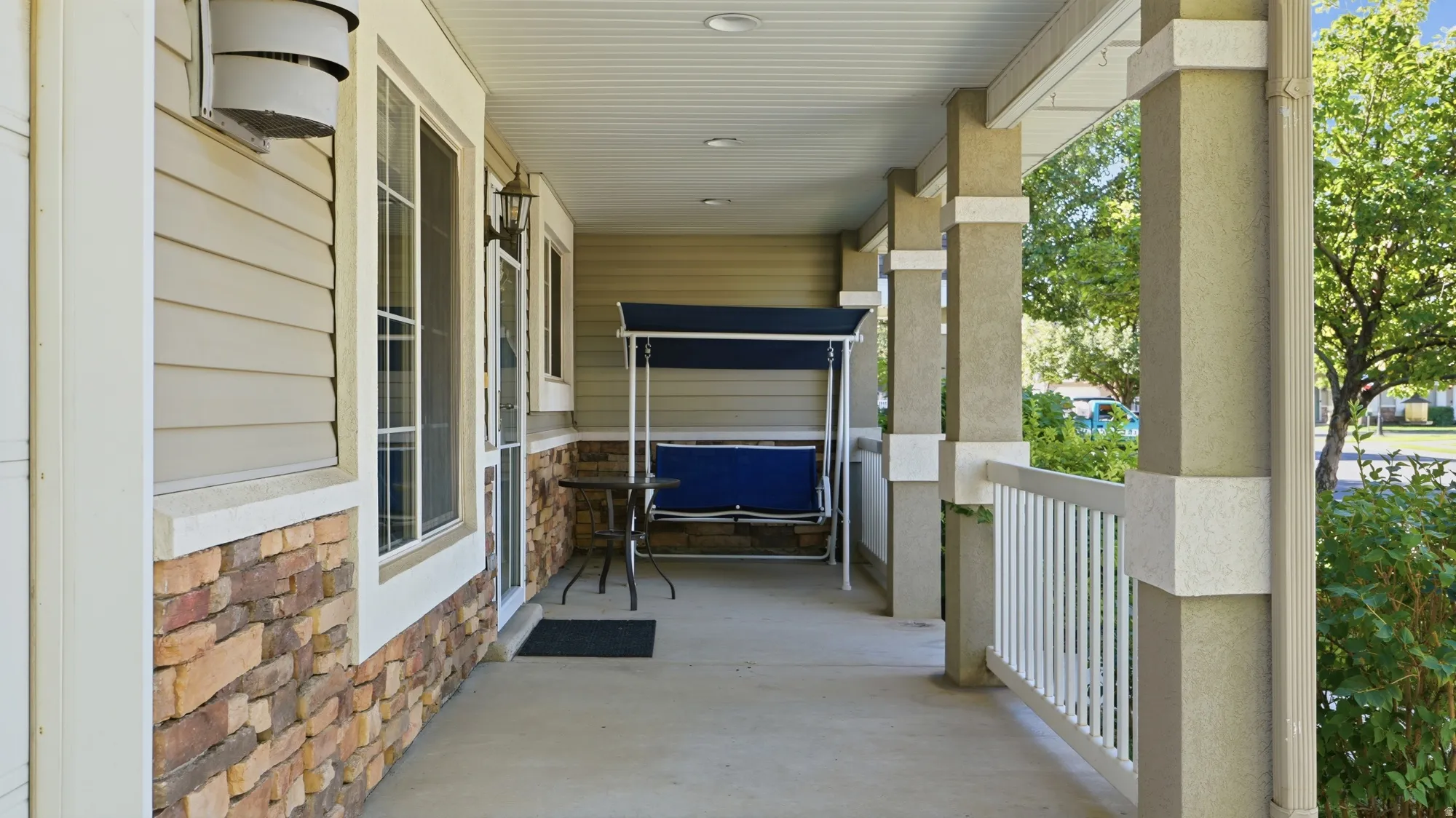 Spacious covered front porch offers plenty of room to relax and enjoy the neighborhood.