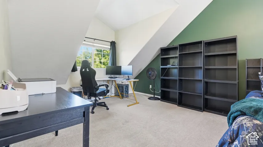 Generously sized primary bedroom offers a flexible layout with space for a dedicated desk or work-from-home area.