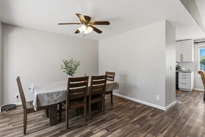 Wood-finish flooring throughout, providing a cohesive aesthetic