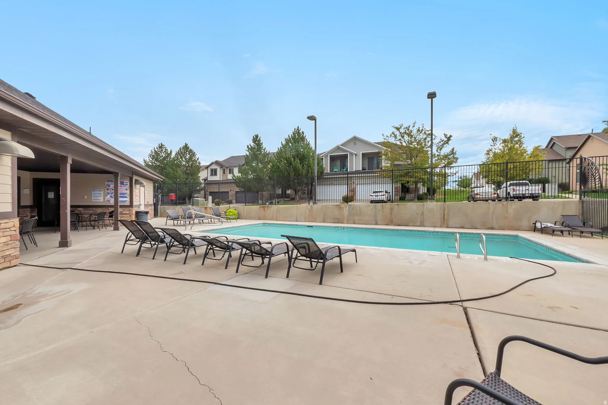 Outdoor swimming pool with concrete surround