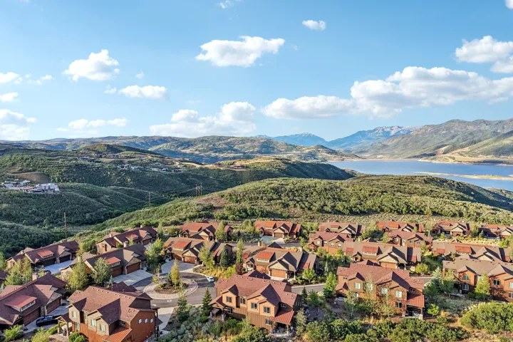 Aerial view of Jordanelle Reservoir and the surrounding Wasatch Back hills above the Hideout, Utah community.