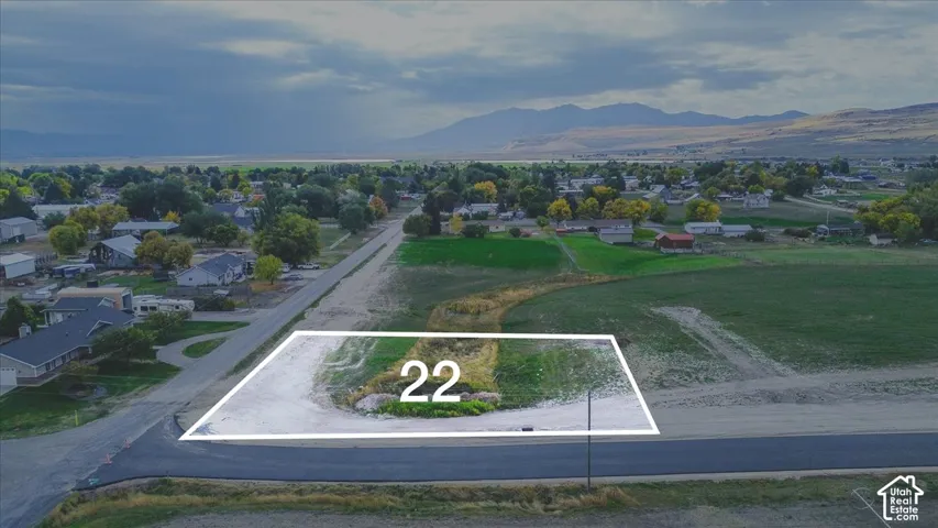 Corner lot featuring paved street frontage and mountain scenery