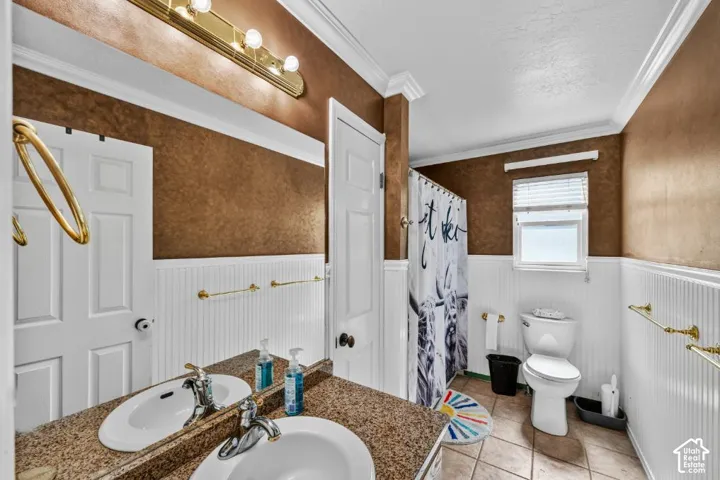 Dual vanity with integrated sinks and a stone-finish countertop