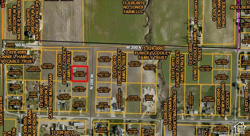 Plat map. Illustrating property divisions and ownership details within the specified area, with a highlighted parcel indicating a particular lot