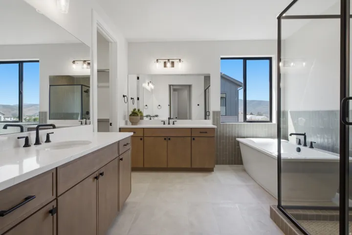 Dual vanity with integrated sinks and matte black fixtures