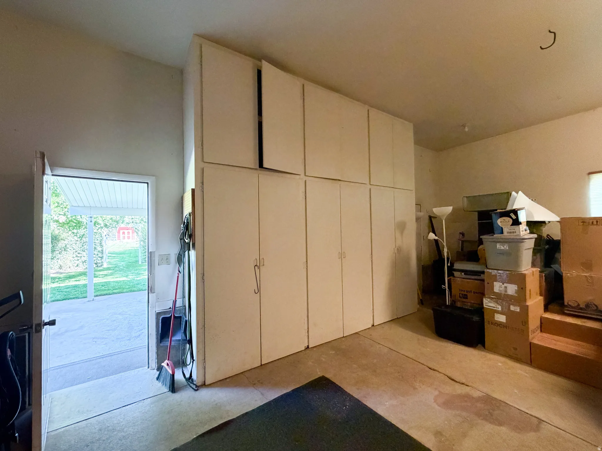 Garage with  storage cabinets
