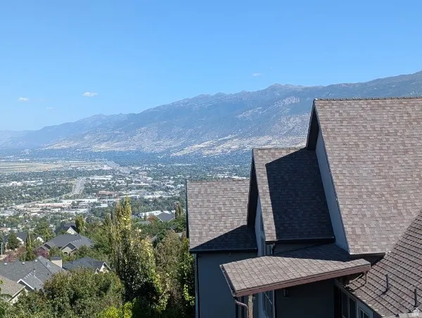Cityscape and mountain backdrop