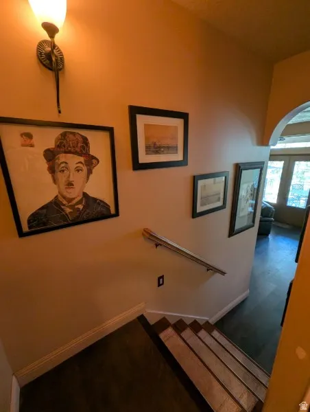 Hardwood stairs with coordinating wood-finish flooring