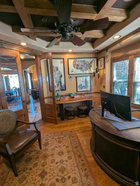 Coffered ceiling with wood beams and recessed lighting