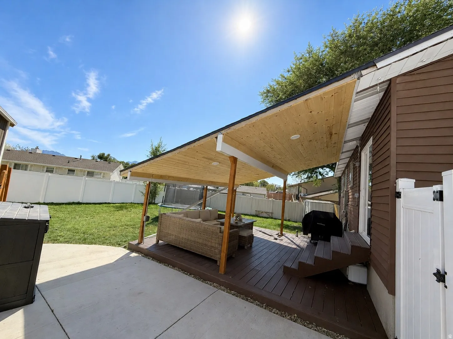Spacious lot with new covered patio! Fully fenced backyard includes a separate fenced chicken enclosure (which could instead be used as a dog run).