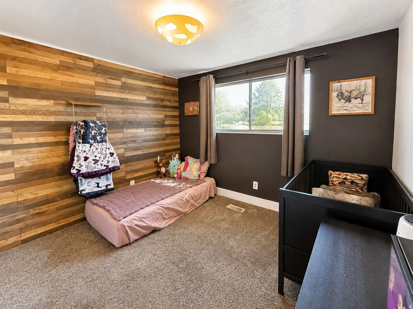 Secondary Bedroom with accent wall