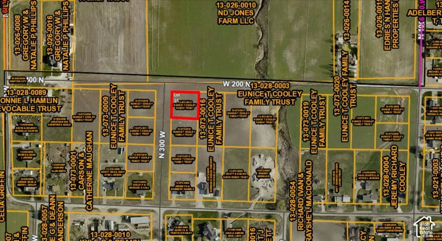 Plat map. An aerial overview displaying property boundaries, parcel identifiers, and owner details