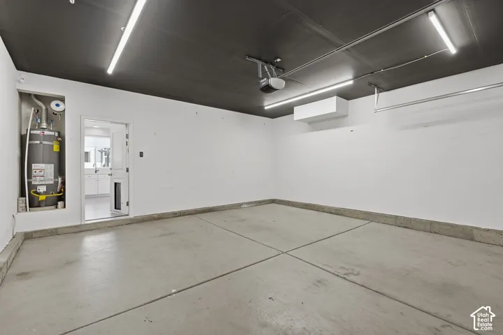 Finished garage with additional lighting