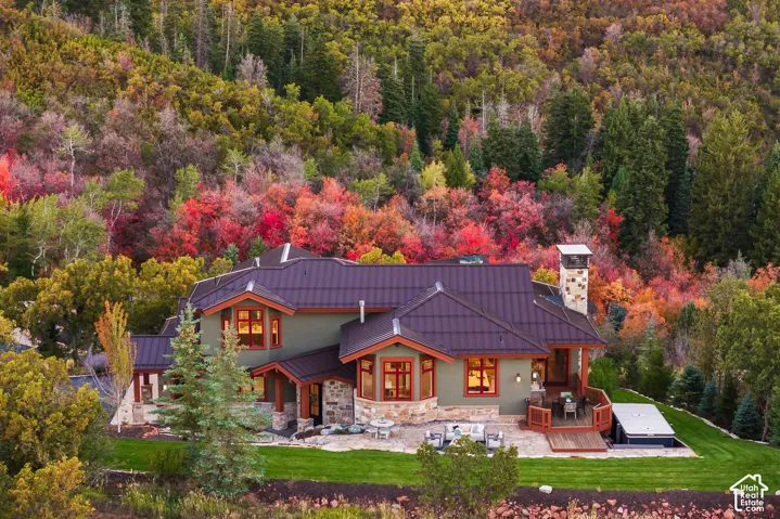 Stone and stucco exterior with multiple gabled rooflines