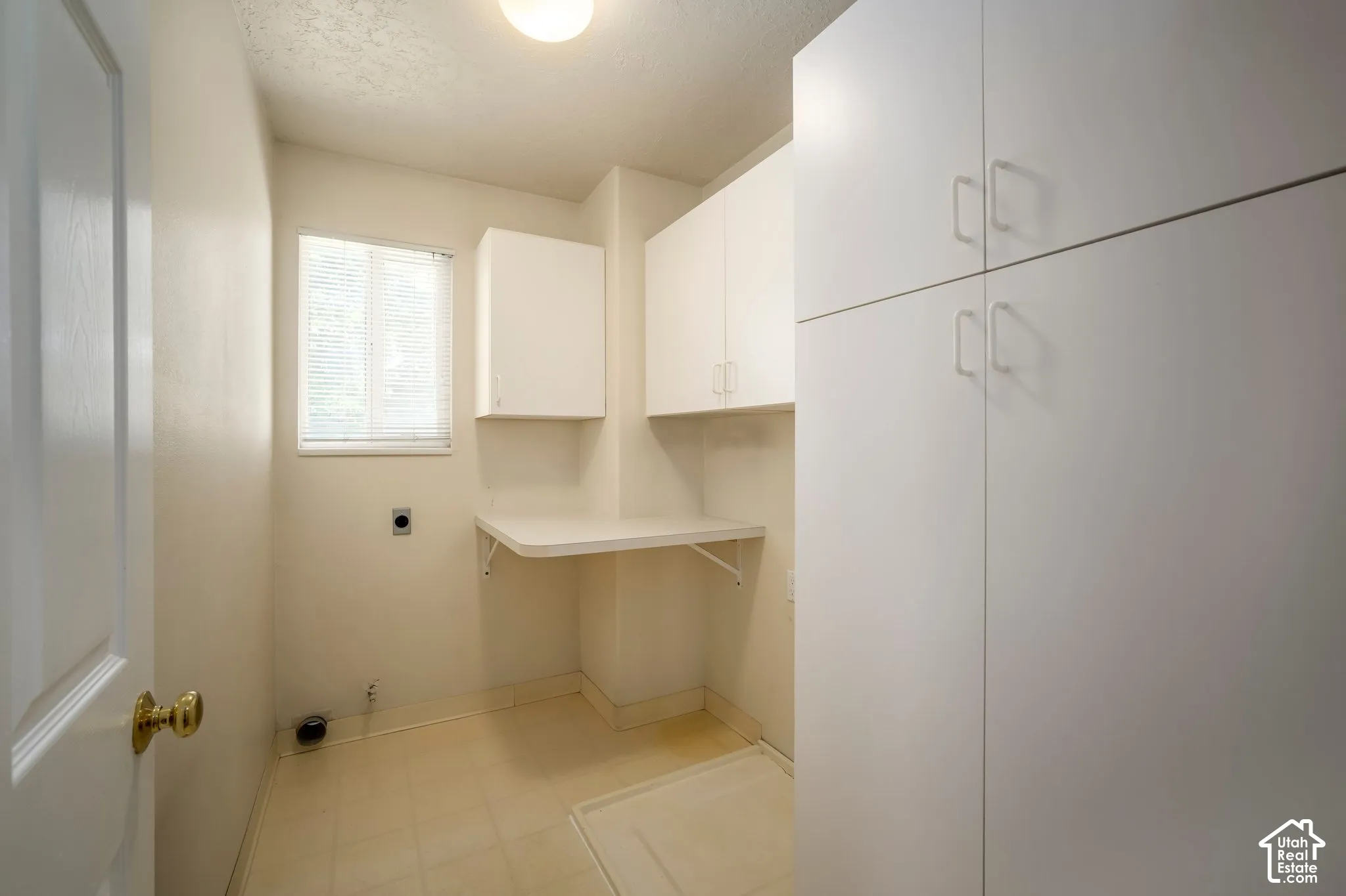 Lots of cabinets in Laundry room
