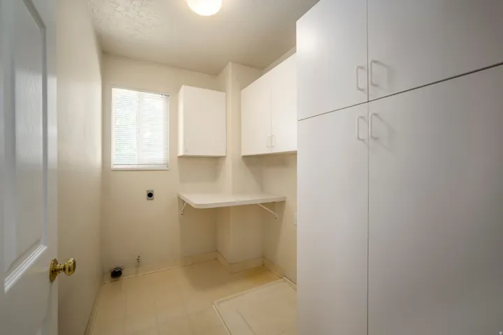 Lots of cabinets in Laundry room