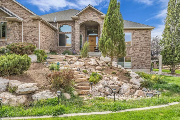 Exterior Front Entrance with rock waterfall