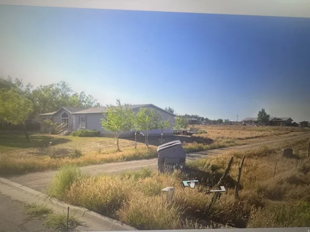 Single-story residence with a pitched roof and a front porch