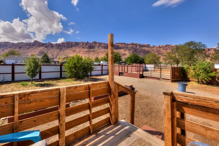 Wood deck with horizontal slat railing