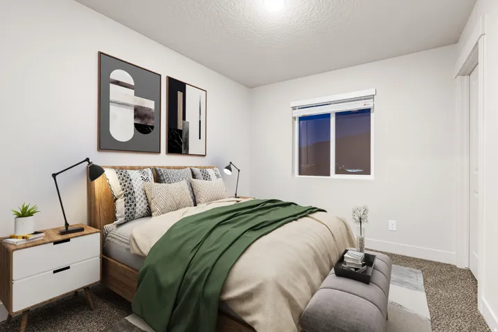 Carpeted bedroom with a single window and white trim