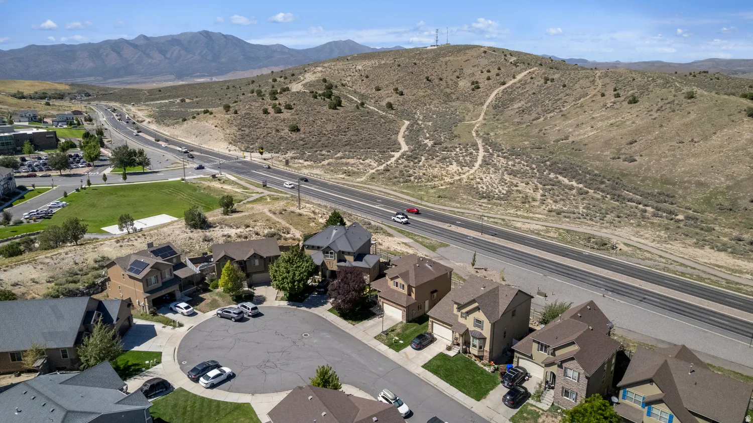Aerial perspective of a cul-de-sac community with varied residential architecture