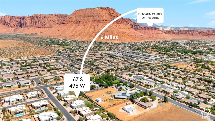 Additional contentThis image is an aerial/location map showing the property's address (67 S 495 W) and its proximity to the Tuacahn Center of the Arts (9 miles away)