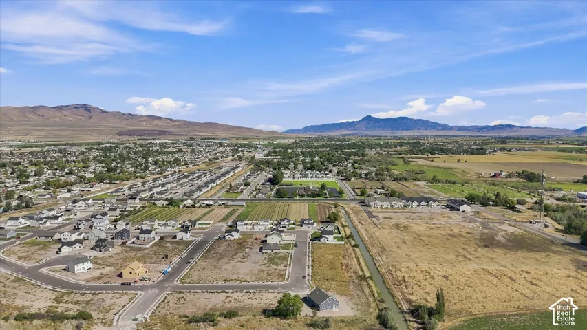 Expansive development site featuring varied terrain and established infrastructure