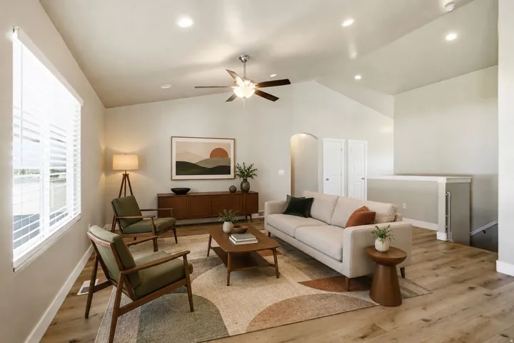 Lots of natural light and vaulted ceilings in this fun family room off the kitchen.