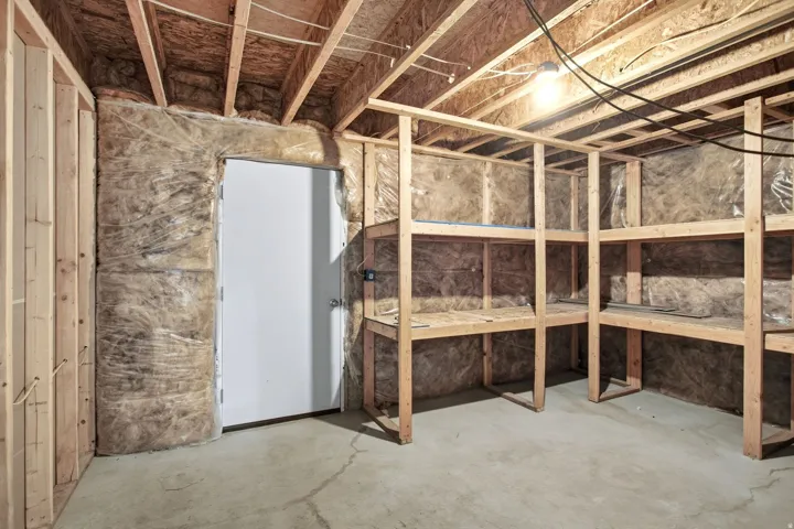 Huge storage area with shelves.