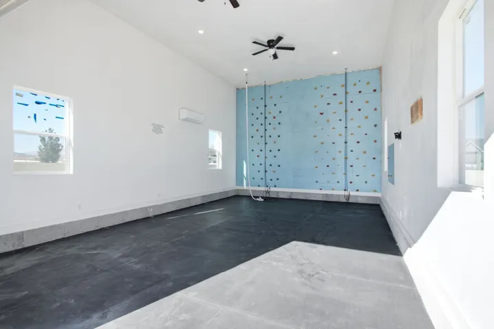 Inside of detached garage.  Has a climbing wall and foam flooring but can be used for whatever you need!