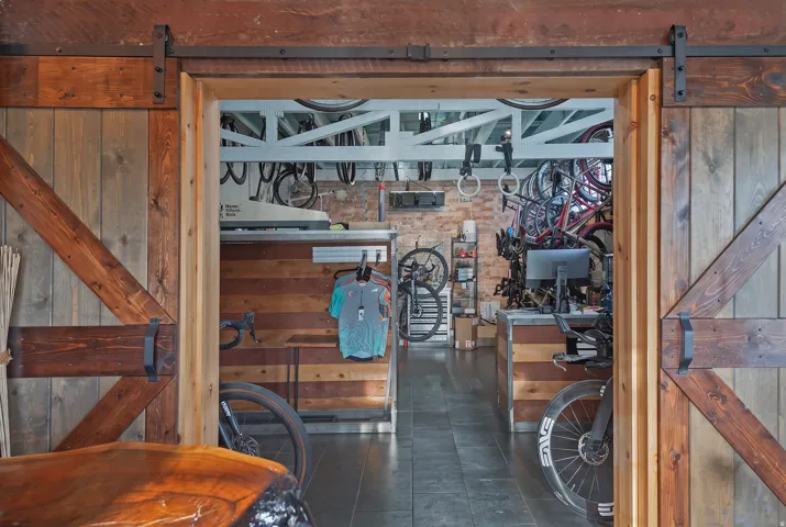 Barn door entry with exposed hardware