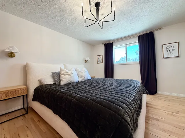 Recessed window with dark drapery