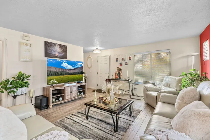 Wood-finish flooring throughout the space