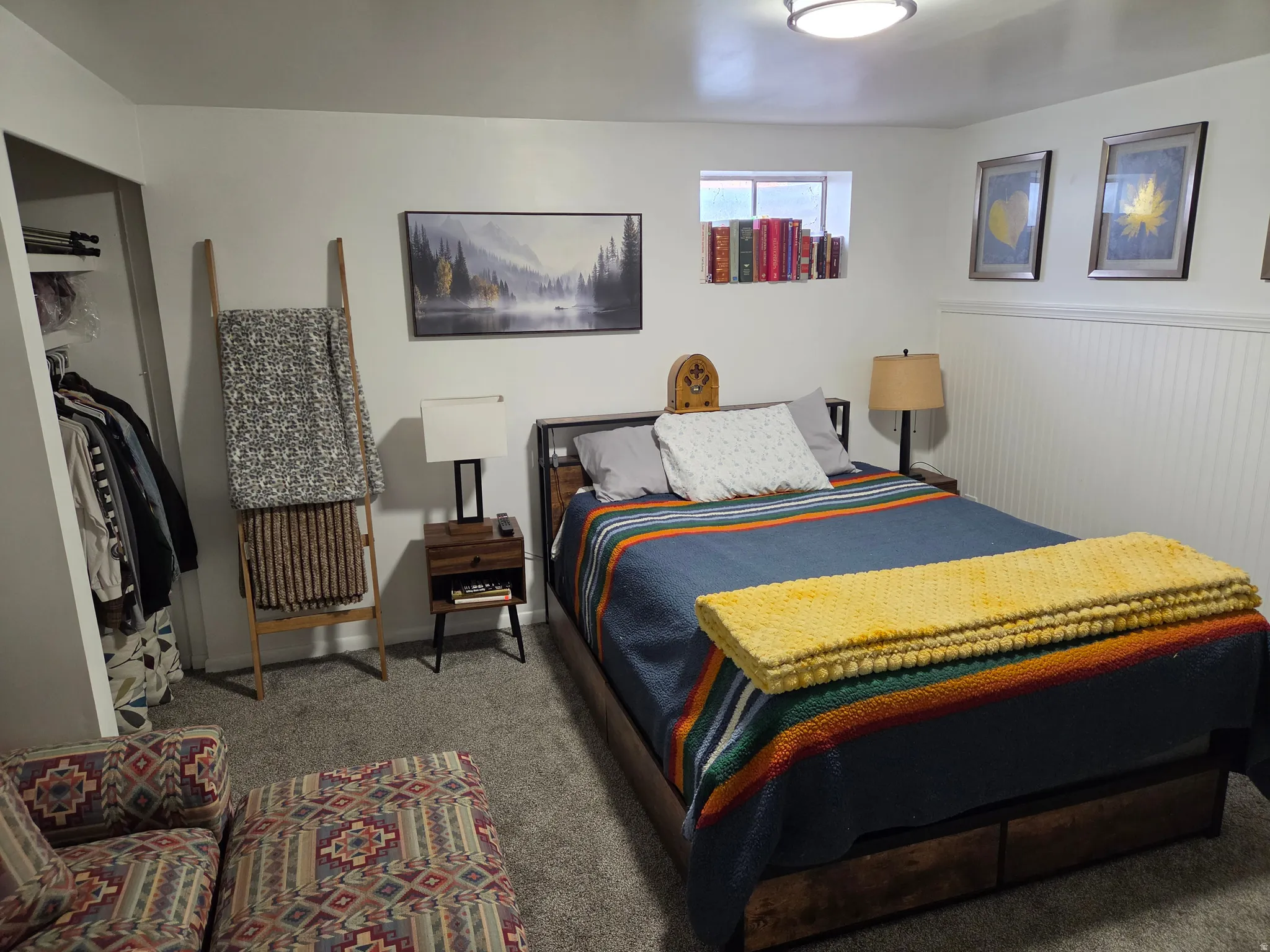 Carpeted flooring, beadboard wainscoting, recessed window, and flush-mount ceiling light