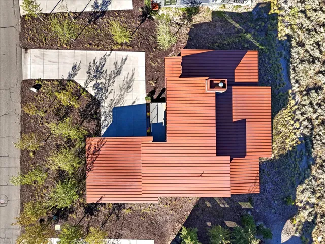 Red metal roofing with multiple distinct sections