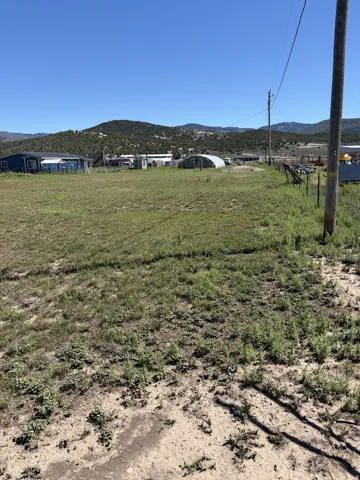 Expansive land parcel featuring open terrain and distant mountains