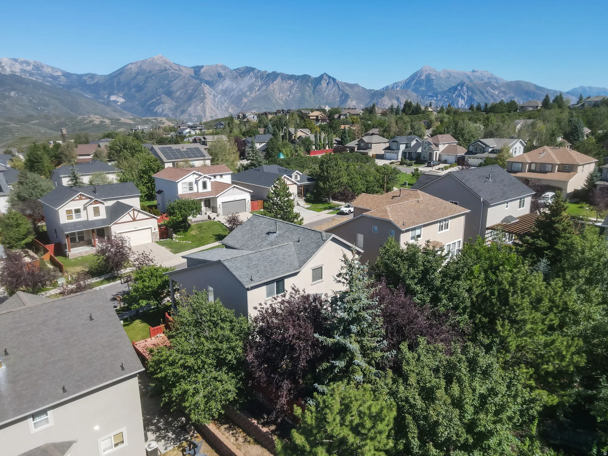 Residential neighborhood with a mountainous backdrop