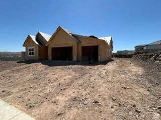 New construction property featuring a gable roof design and an integrated two-car garage