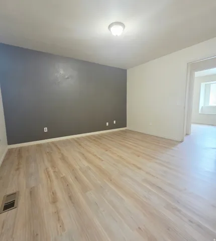 Wood-finish flooring throughout