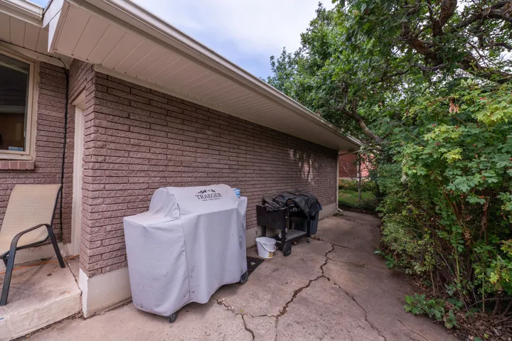 Brick exterior with white soffit and fascia