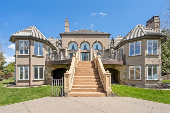 Multi-level stucco exterior with tile roofing