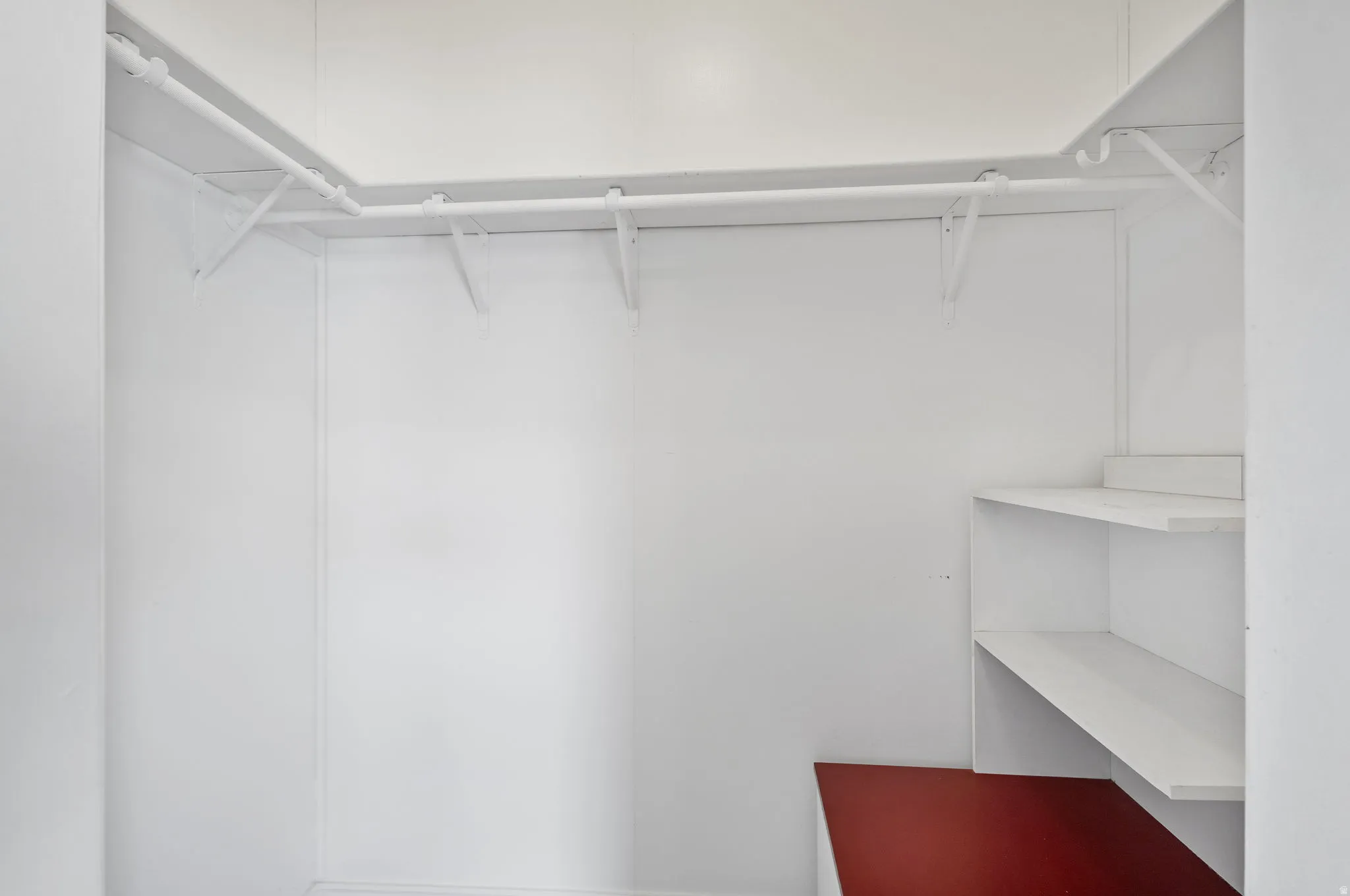 Built-in closet shelving and hanging rods