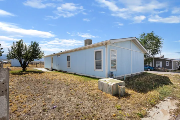Light blue siding exterior with white trim