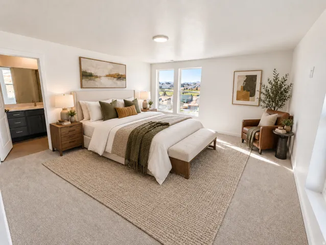 Spacious room featuring light-toned carpeting and multiple large windows