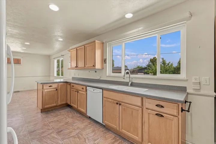 Kitchen with large window.