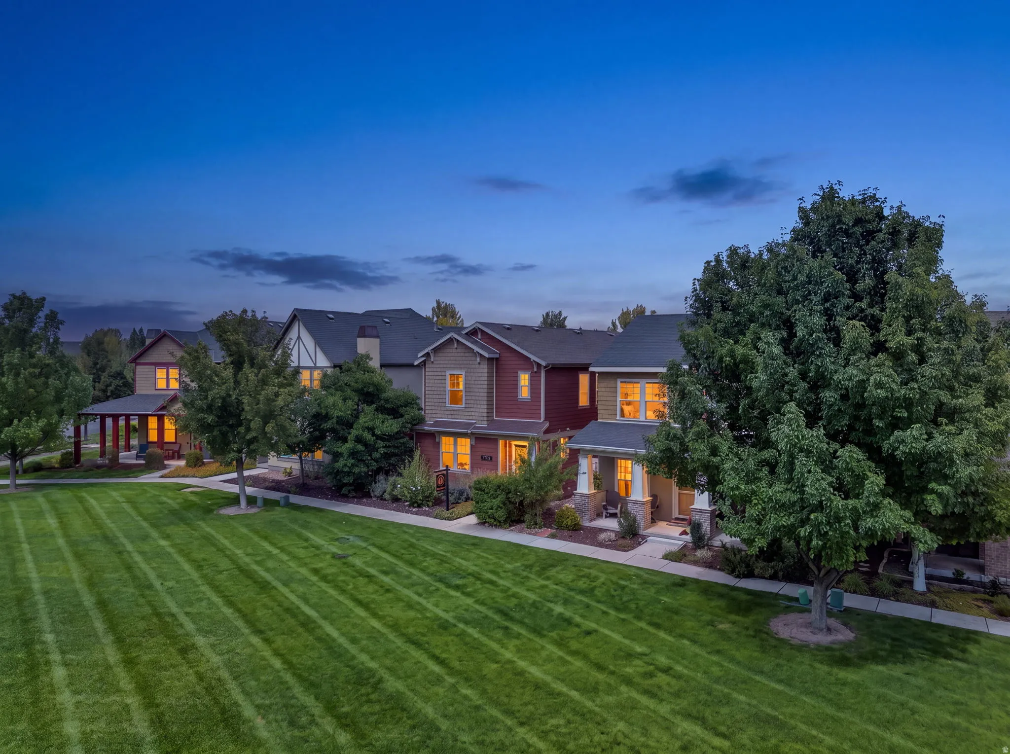Manicured green space with striped lawn