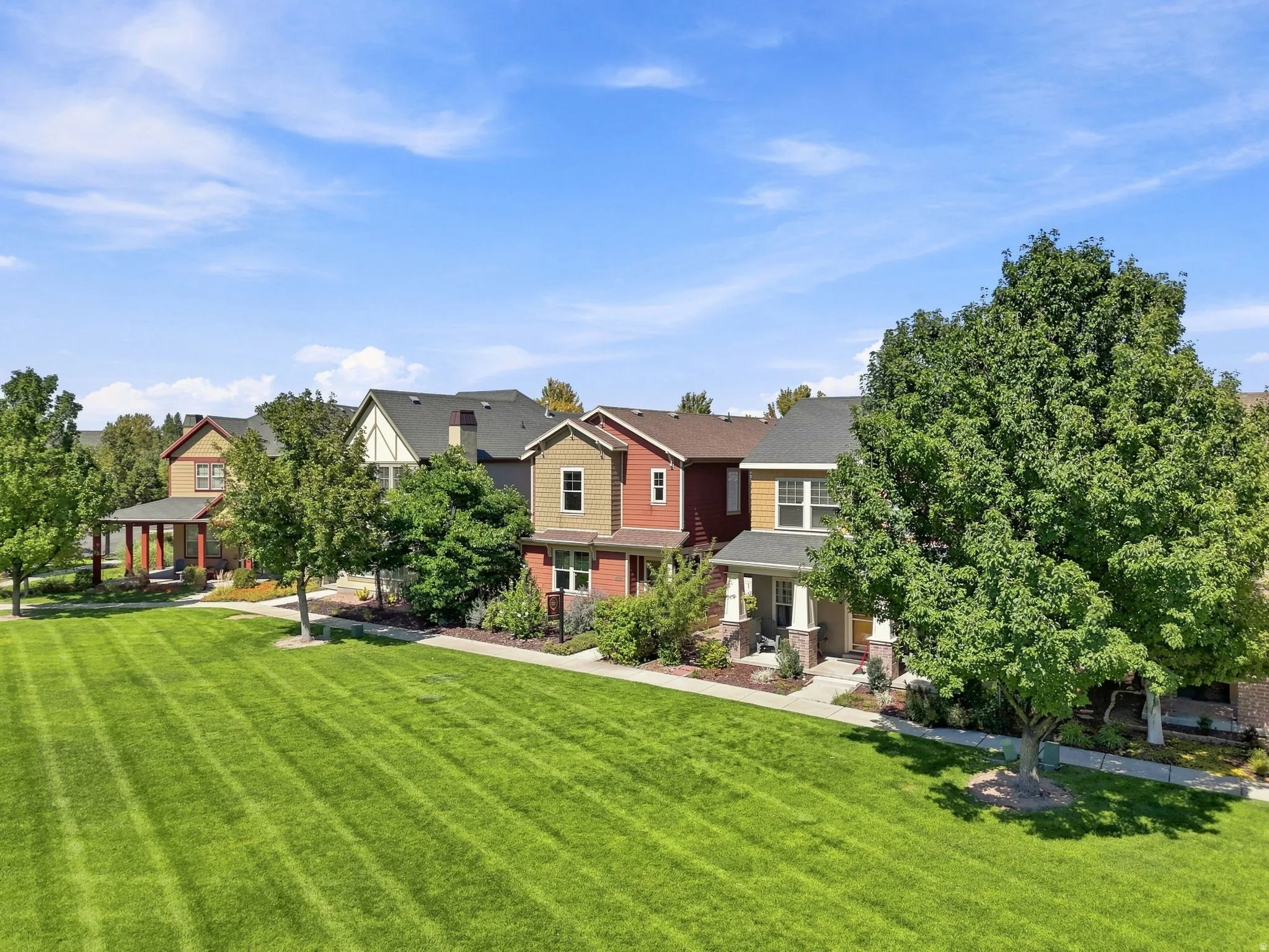 Expansive green space with mature trees