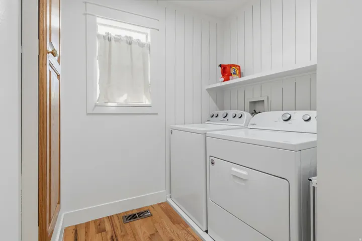 White paneled walls with an integrated shelf