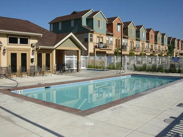 Outdoor swimming pool with concrete surround